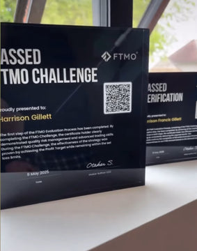 Two black 'Passed Challenge' certificates with FTMO branding and a QR code on a white surface.