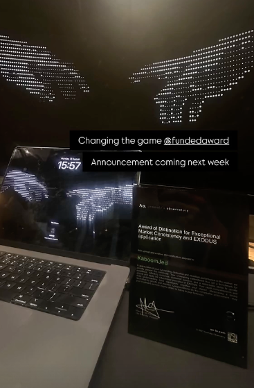 A clean computer setup and a Funded certificate from Funded Award
