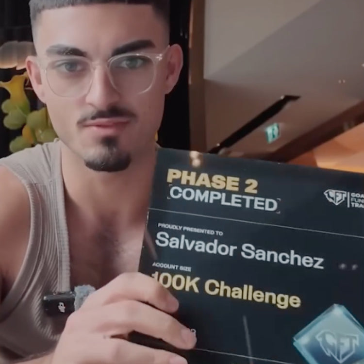 Man holding a plaque celebrating Phase 2 completion with 'Salvador Sanchez' and '100K Challenge'.